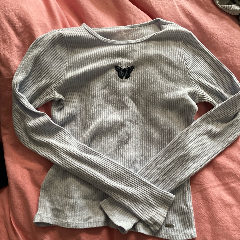 Hollister Pale Blue Ribbed Long-Sleeve Top with Black Butterfly